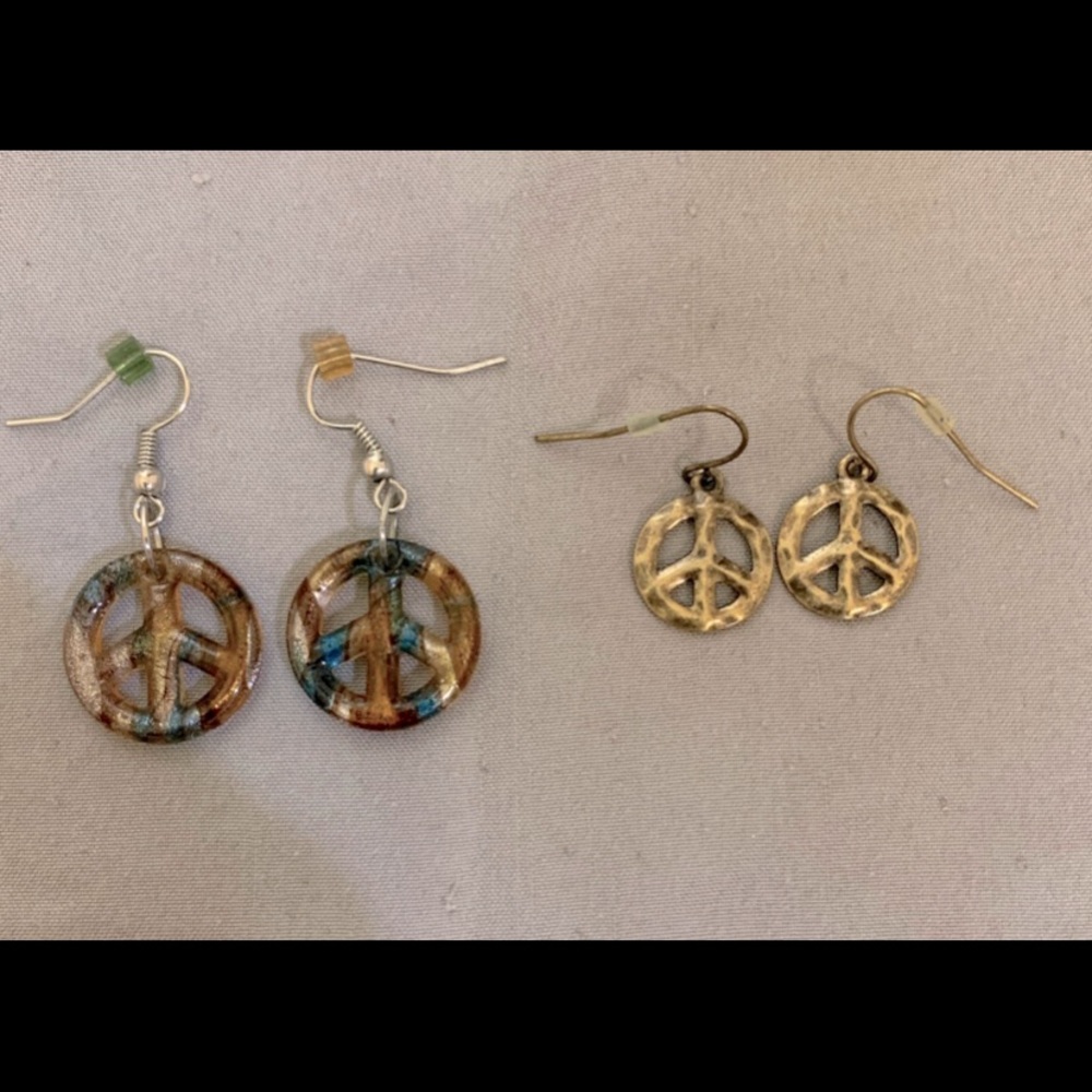 Two sets of Peace earrings